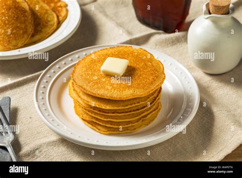 Homemade Corn Meal Johnny Cakes With Butter And Syrup Stock Photo Alamy