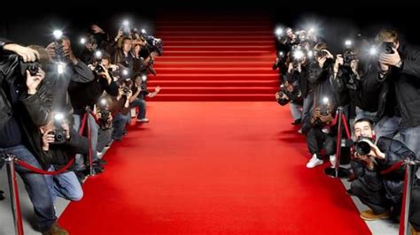 Red Carpet Press Cameras Flashing Pictures Taken Interviews