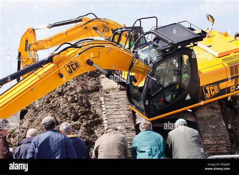 JCB digger being demonstrated Stock Photo - Alamy