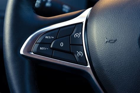 Premium Photo Control Buttons On The Steering Wheel Of A Modern Car