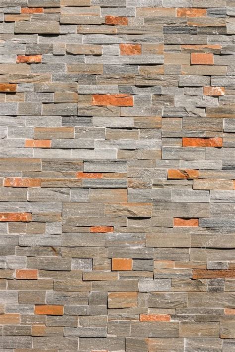 Natural stone veneer wall Stock Photo by ©pstedrak 118303420