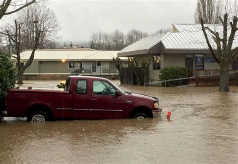 Rain and flooding to continue into the weekend, but Seattle area could ...