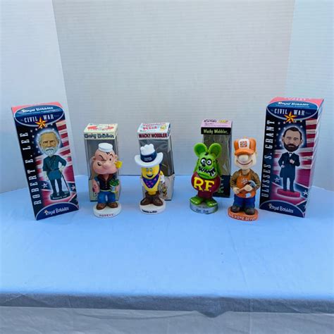 Lot #227- Various Bobble Heads: Popeye, Twinkie, Rat Fink, Robert E ...