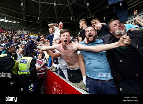 Leeds United Fans Celebrate Survival After The Premier League Match At The Brentford Community