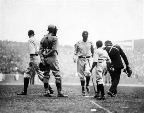 Babe Ruth Touches Home Plate After Hitting The First Home Run At Yankee Stadium On The Day Of