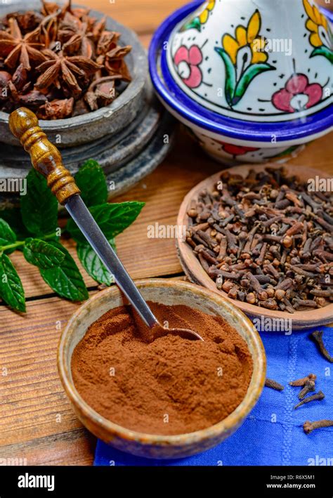 Bowls With Dried Clove Buds And Cloves Powder Used For Cooking And