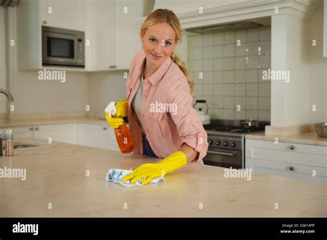 Woman Wearing Rubber Gloves Hi Res Stock Photography And Images Alamy