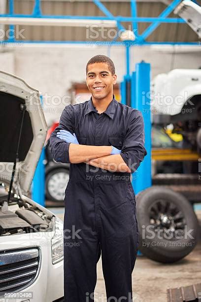 Proud Mechanic Smiles To Camera Stock Photo Download Image Now