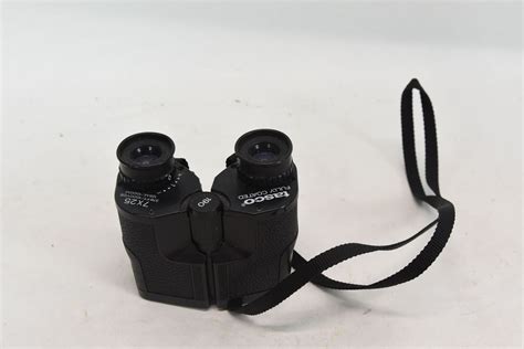 Tasco 7 X 25 Binoculars In Case