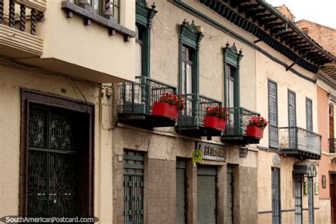 Red Flowers Along Iron Balconies Nice Facades In Cuenca Photo From