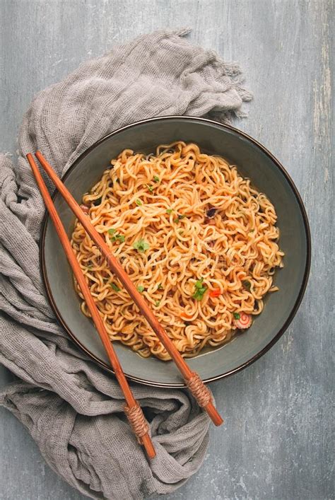 Instant Noodles In A Bowl On A Gray Table Top View No People Stock