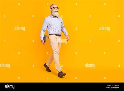 Photo Of Lucky Cute Mature Man Dressed Formal Outfit Spectacles Holding