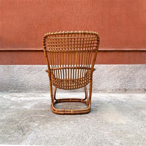 Mid Century Italian Rattan B Armchair And Pouf By Tito Agnoli For