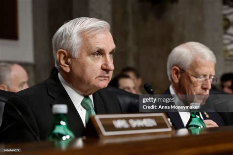 Senate Armed Services Committee Chairman Jack Reed speaks alongside ...