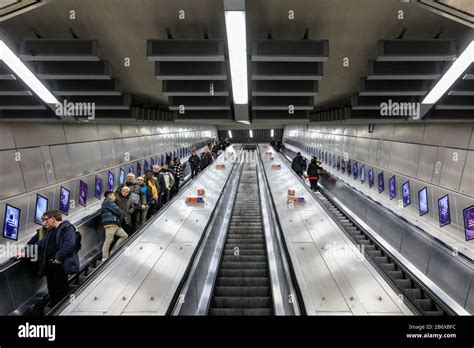 People On London Underground Tube Station Escalators Tottenham Court