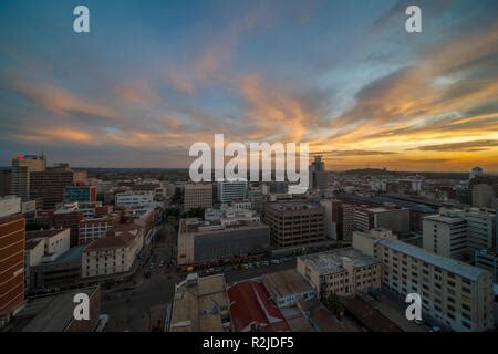 A sunset is seen over the Harare city skyline in Zimbabwe Stock Photo - Alamy