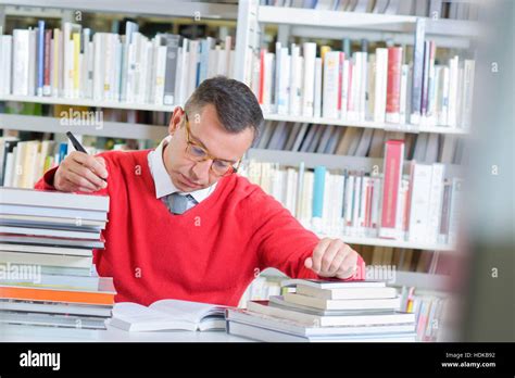 Busy Reader In The Library Stock Photo Alamy