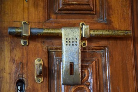 Stock Photo Of Antique Indian Style Bronze Metal Door Lock On Wooden