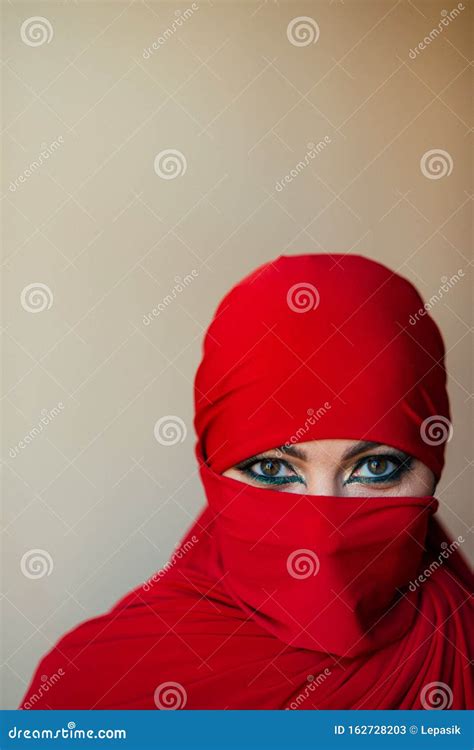 A Beautiful Oriental Woman With Makeup Covered Her Face With A Red Handkerchief Oriental Laws