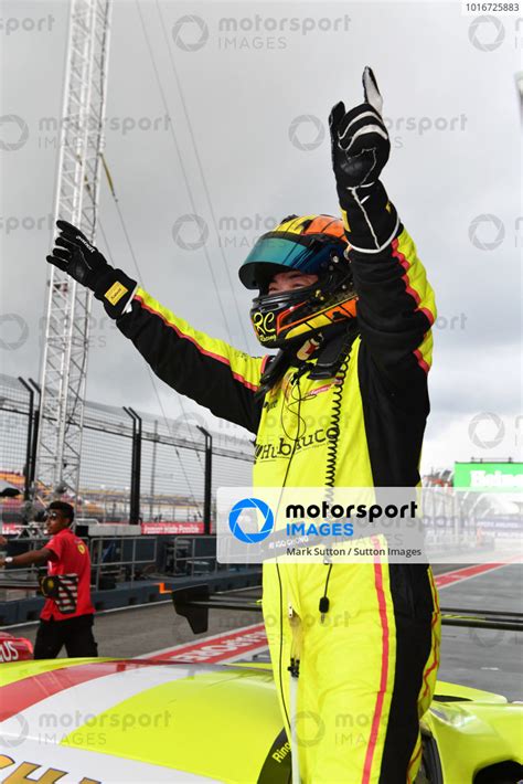 Race Winner Ringo Chong Sin Celebrates In Parc Ferme At Ferrari