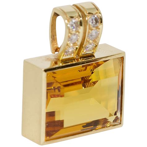 Yellow Gold Pendant Enhancer With Large Emerald Cut Citrine For Sale