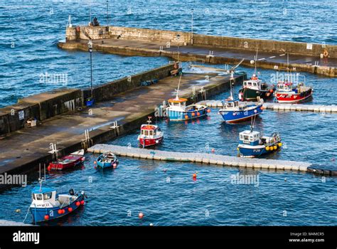 View Of Colourful Small Fishing Boats In Harbour Picturesque Seaside