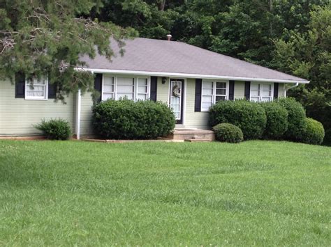 Light Pale Green With Black Shutters House Exterior Black Shutters