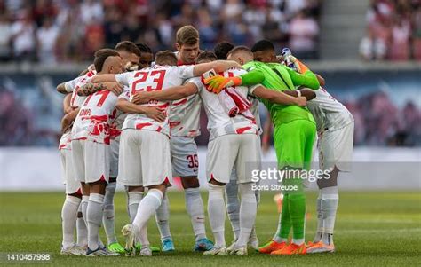 Players of Leipzig stand in a circle prior to the pre-season friendly ...