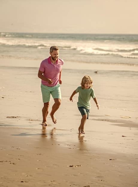 Premium Photo Father And Son Running On Summer Beach Travel