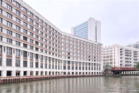 White Concrete Building Near Body Of Water During Daytime Photo Free Chicago Image On Unsplash