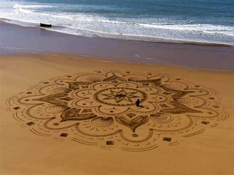 Artist Creates Huge Mandalas On Beach Inspired By Arabic Designs