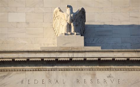 Federal Reserve Keeps Interest Rates On Hold Signals Three Rates Cuts