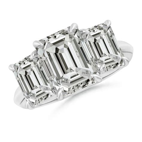 Buy ANGARA Emerald Cut Diamond Three Stone Knife Edge Shank Engagement