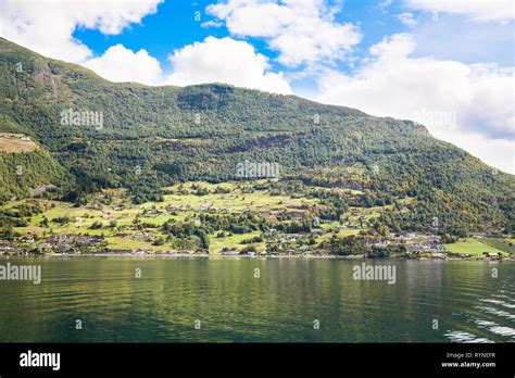 Landscape With Naeroyfjord Mountains And Traditional Village Houses In