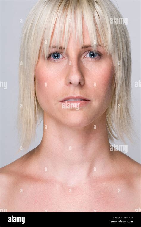 Portrait Of An Healthy Calm Blonde Woman With Bare Shoulders Stock