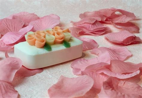 Premium Photo Handmade Soap With Roses On A Background Of Rose Petals