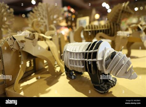 Different creative products made out of cartons are displayed in ...