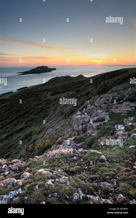 Sunset at Worms Head, The Gower, Wales Stock Photo - Alamy