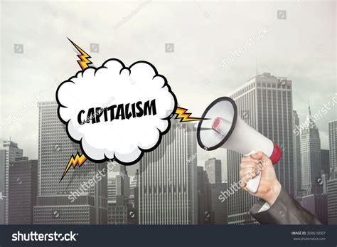 Capitalism Text On Speech Bubble And Businessman Hand Holding Megaphone