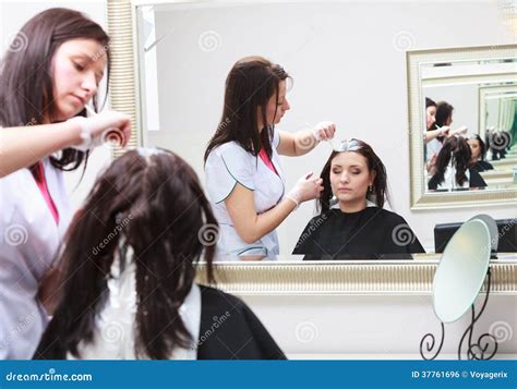 Hairdresser Applying Color Female Customer At Salon Doing Hair Dye