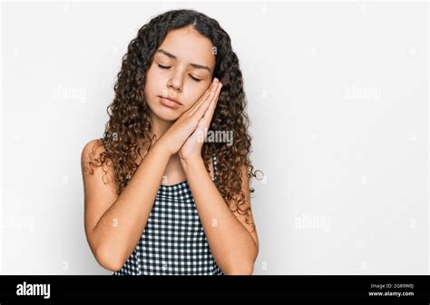 Teenager Hispanic Girl Wearing Casual Clothes Sleeping Tired Dreaming