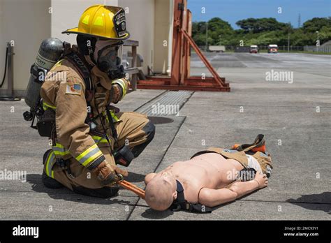 A Firefighter With Marine Corps Installations Pacific Fire And