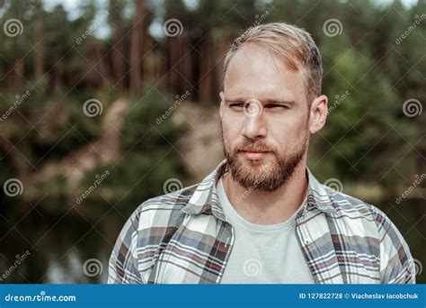 Portrait Of Handsome Man Looking At Nice Mountains While Traveling The