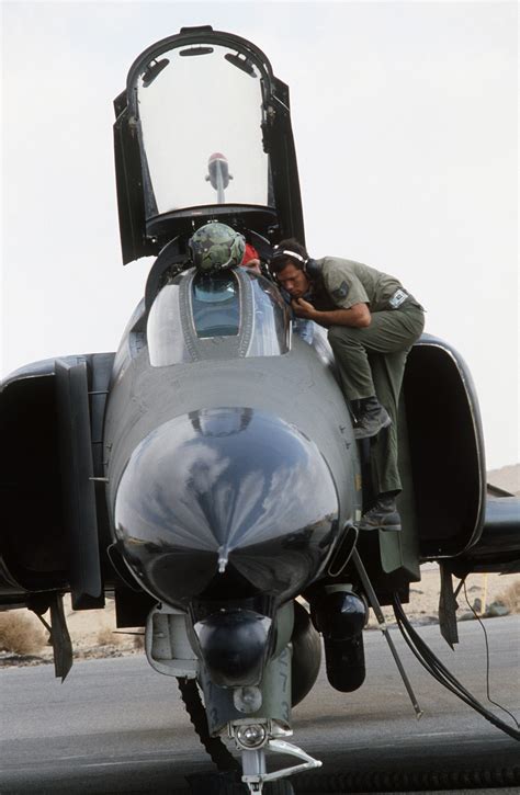 Ground Crewman Service An F 4G Phantom II Advanced Wild Weasel Aircraft