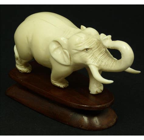 ANTIQUE HAND CARVED IVORY ELEPHANT