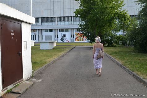 Beautiful Blonde Anastasia Walks Barefoot In The Hot Summer City Part Of