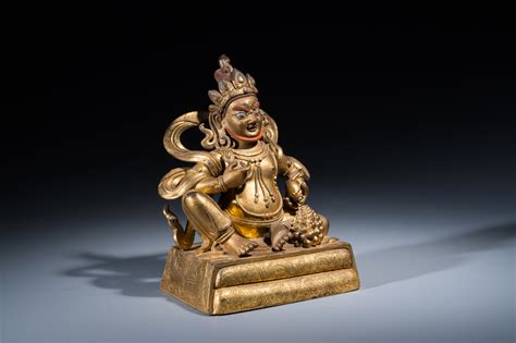 A Fine Sino Tibetan Gilt Bronze Sculpture Of Jambhala 18th C Rob