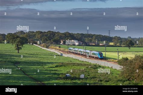 First Transpennine Express CAF class 397 electric train 397001 passing the countryside on the ...