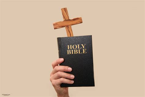 Hand Holding Holy Bible Book - Boxist.com Photos Portfolio