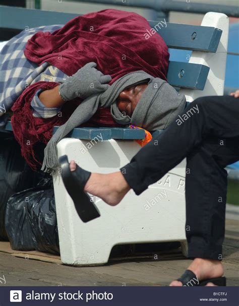 Homeless Sleeping In Cardboard Box High Resolution Stock Photography